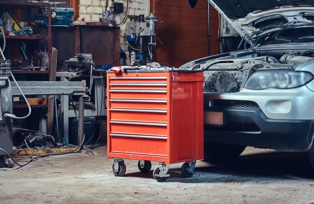 Red steel tool box in a garage (1)
